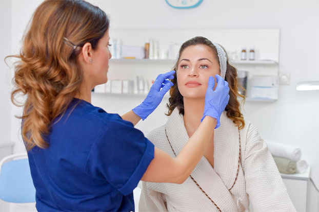 Woman being ready for aesthetic treatment at Luminous
