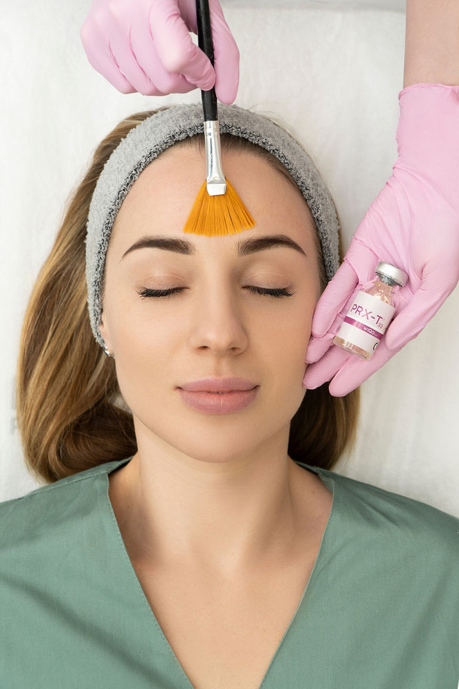 Woman getting an PRX Derm Perfexion treatment at Luminous